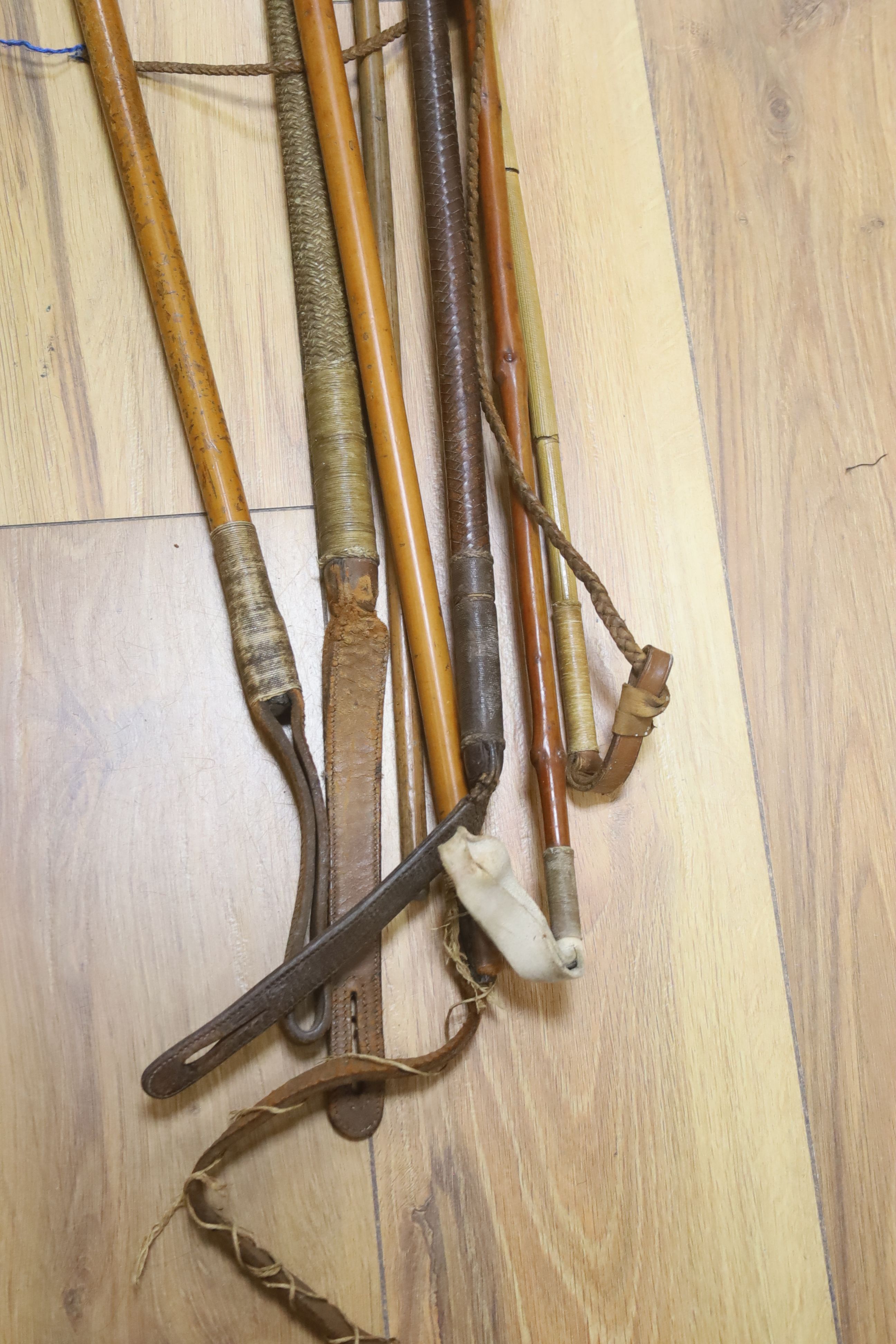 Seven various riding crops, four silver mounted